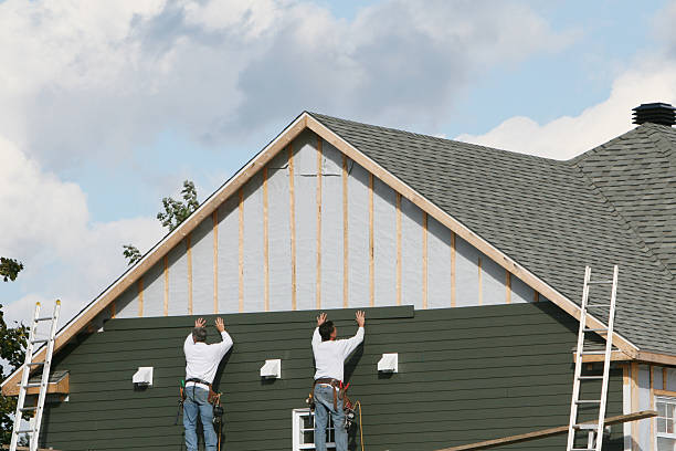 Professional Siding Replacement technician working in Lehigh Acres, FL